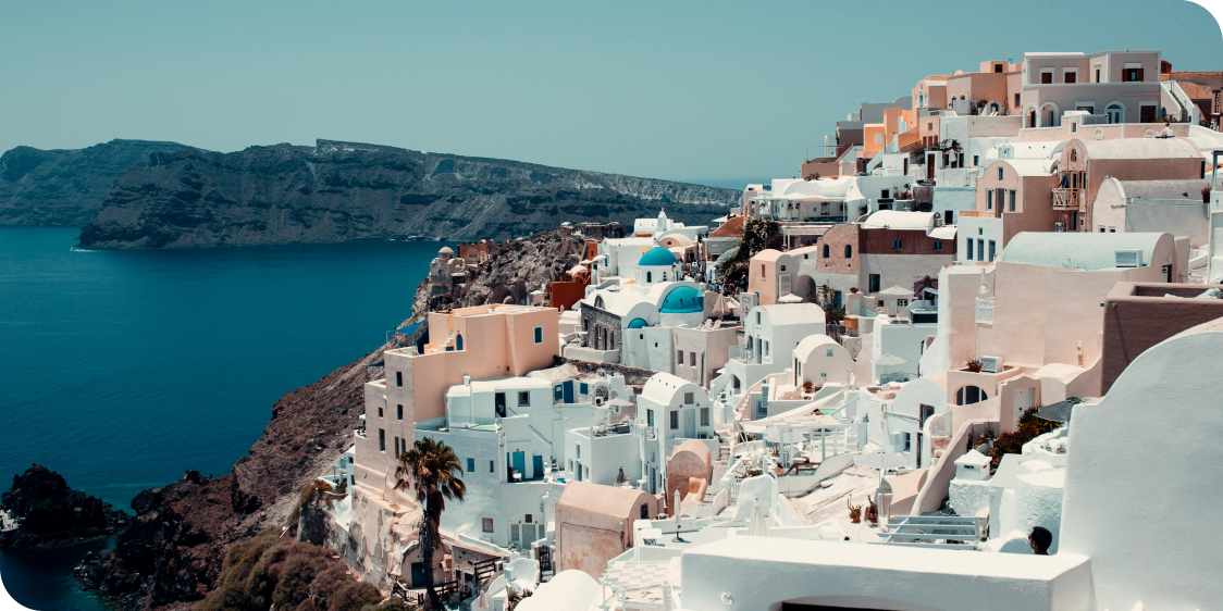 Santorini, Greece White and Brown Concrete Houses Near Body of Water