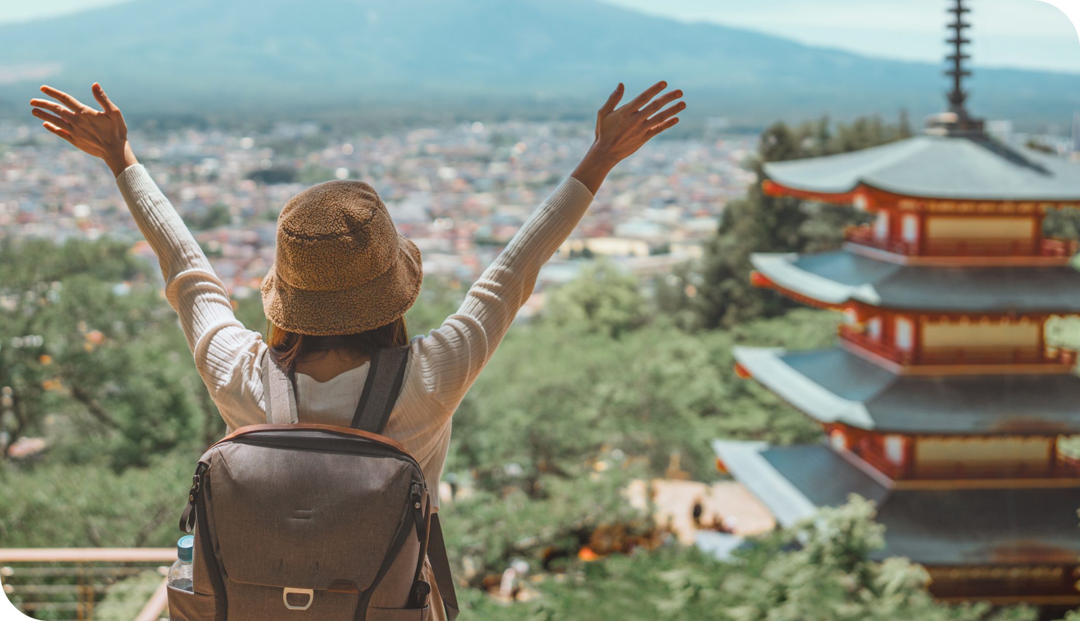 Gigasure blog, Happy woman traveling in japan during spring at chureito pagoda fuji background – scenic and cultural tourism